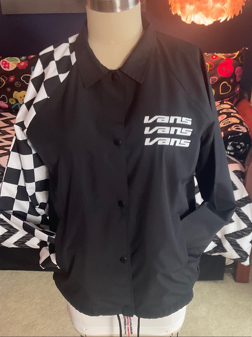 Vans Black Jacket with White Checkerboard Sleeve Panels